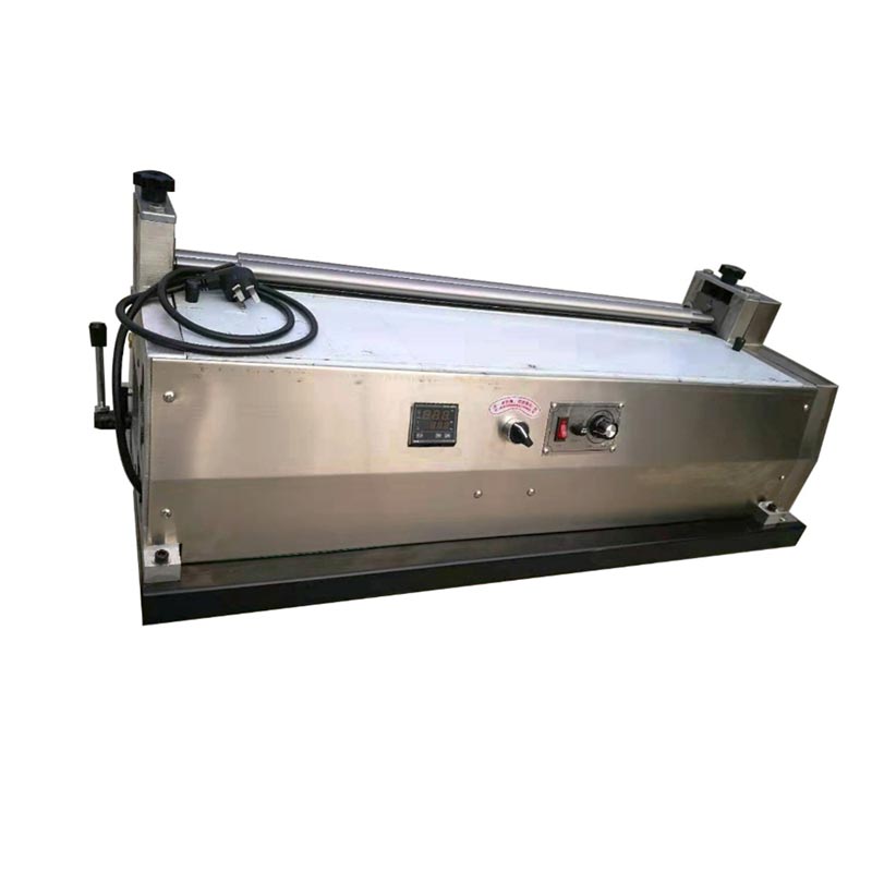 Eskuzko mahaigaineko itsasteko makina