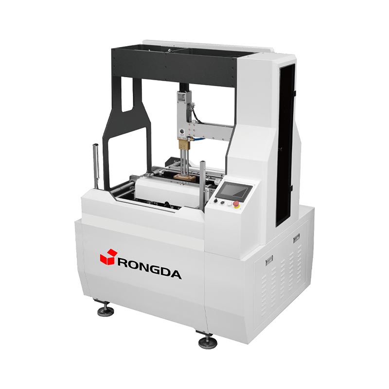 Kutxa zurrunak biltzeko makina